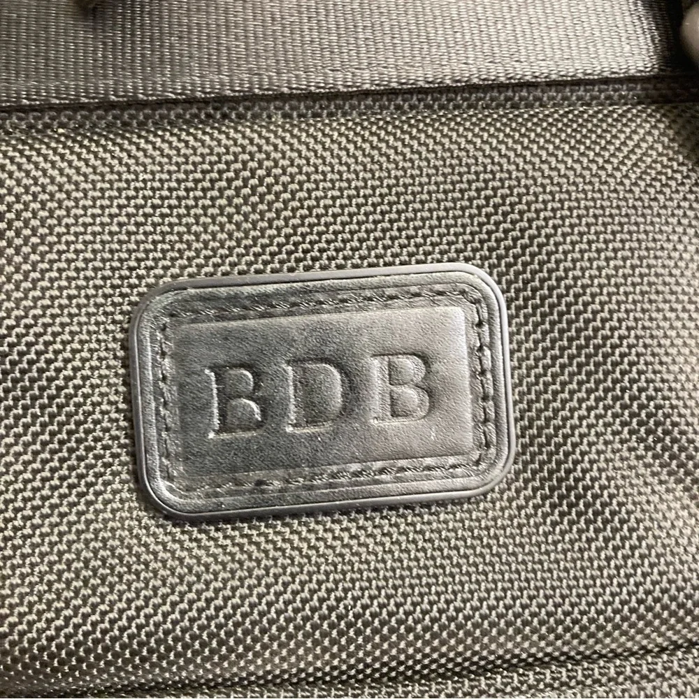 Tumi black alpha bravo soft duffle bag